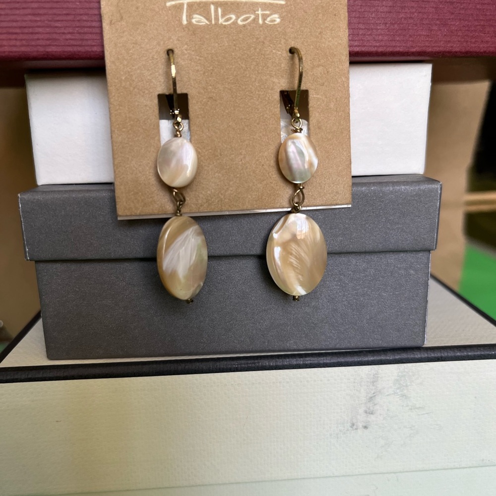 TALBOTS. Very cute, mother of pearl; does not pull on the ears!
